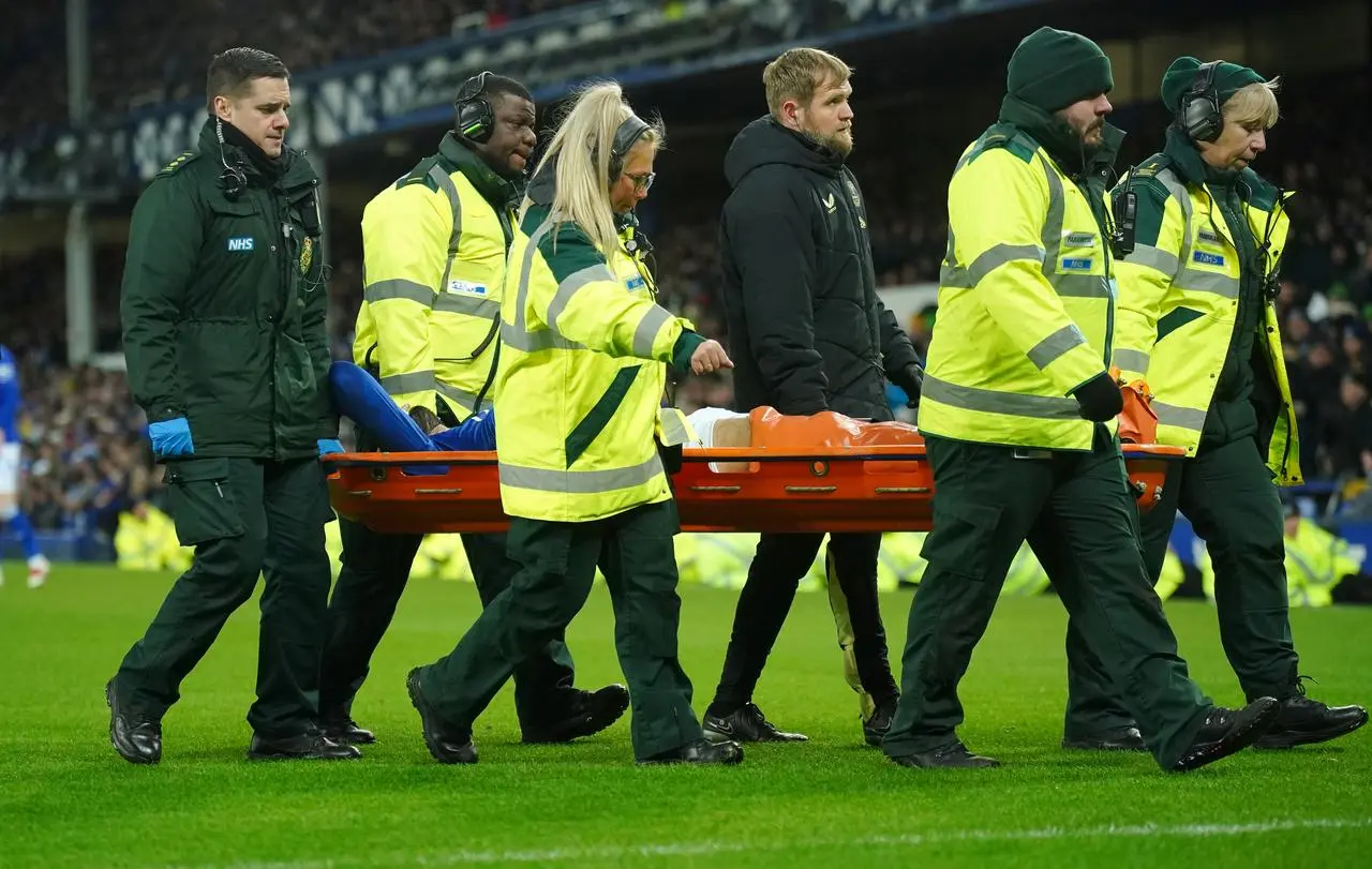 Everton’s Armando Broja leaves the game on a stretcher