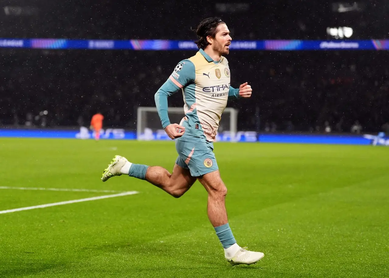 Manchester City’s Jack Grealish celebrates scoring against PSG