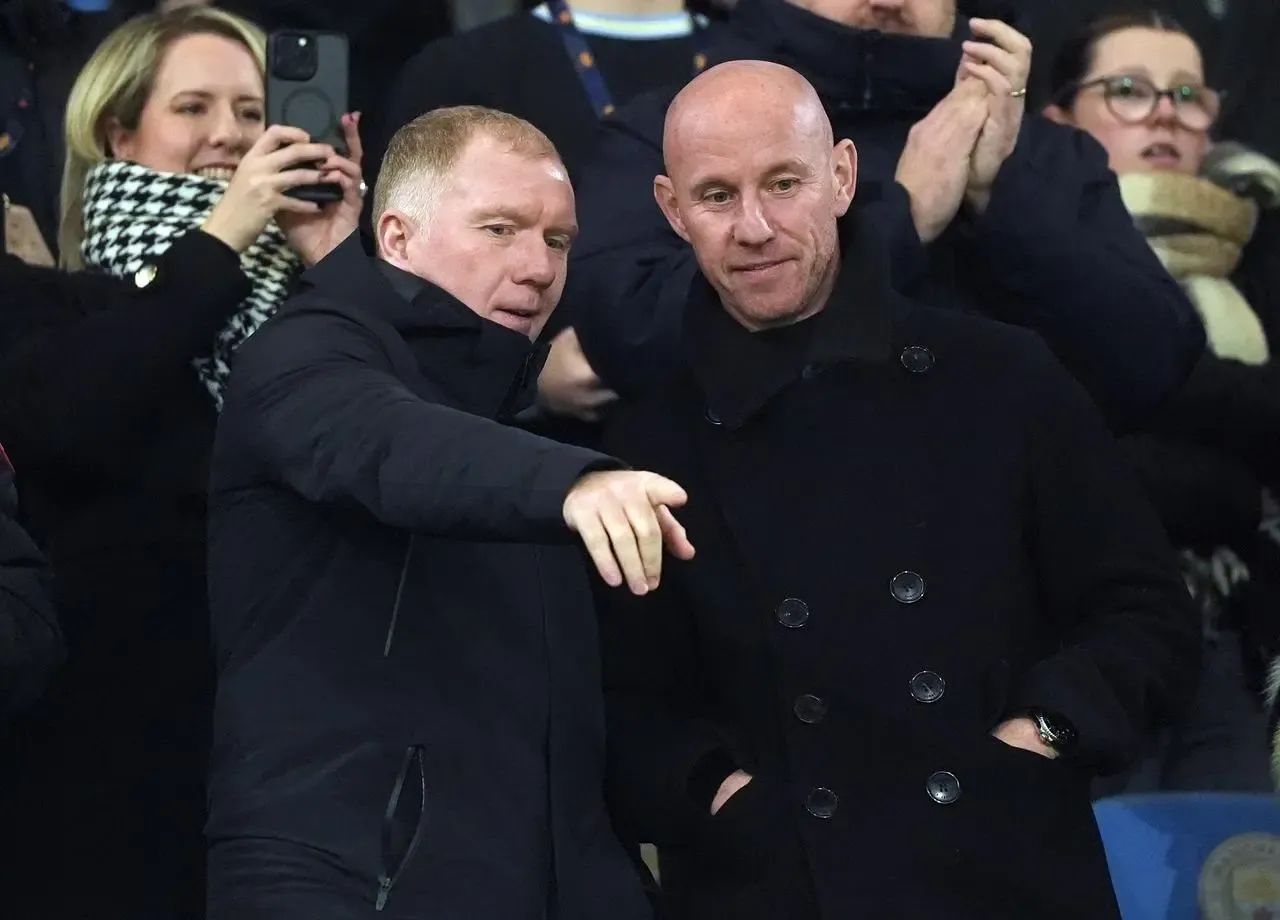 Salford City directors Nicky Butt and Paul Scholes looked on from the stands