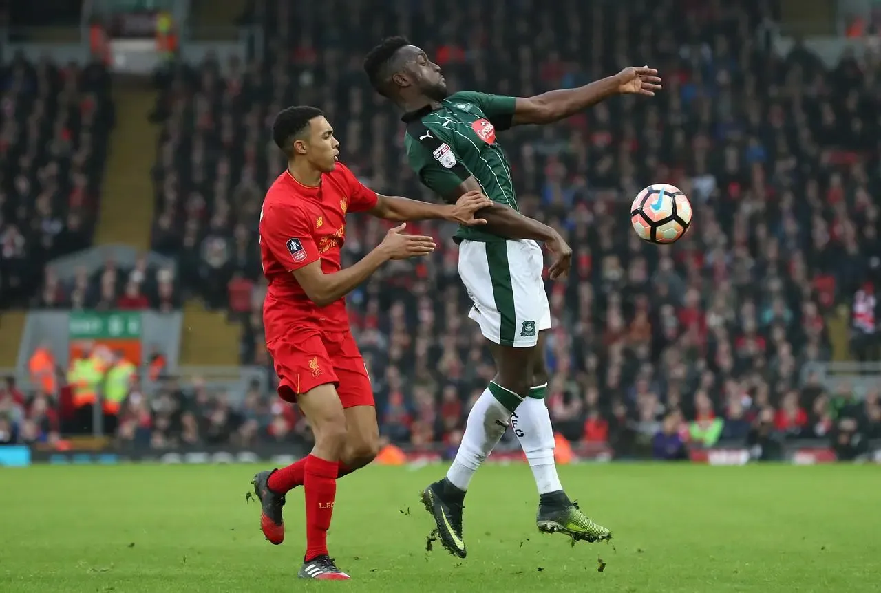 Jordan Slew in action for Plymouth at Liverpool in 2017 (Martin Rickett/PA)