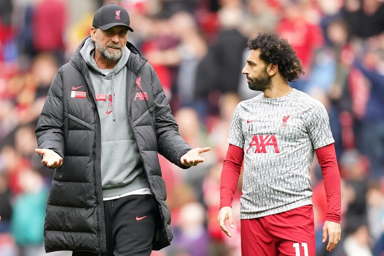 Jurgen Klopp (left) and Salah speaking ahead of a Liverpool match last season (Mike Egerton/PA)