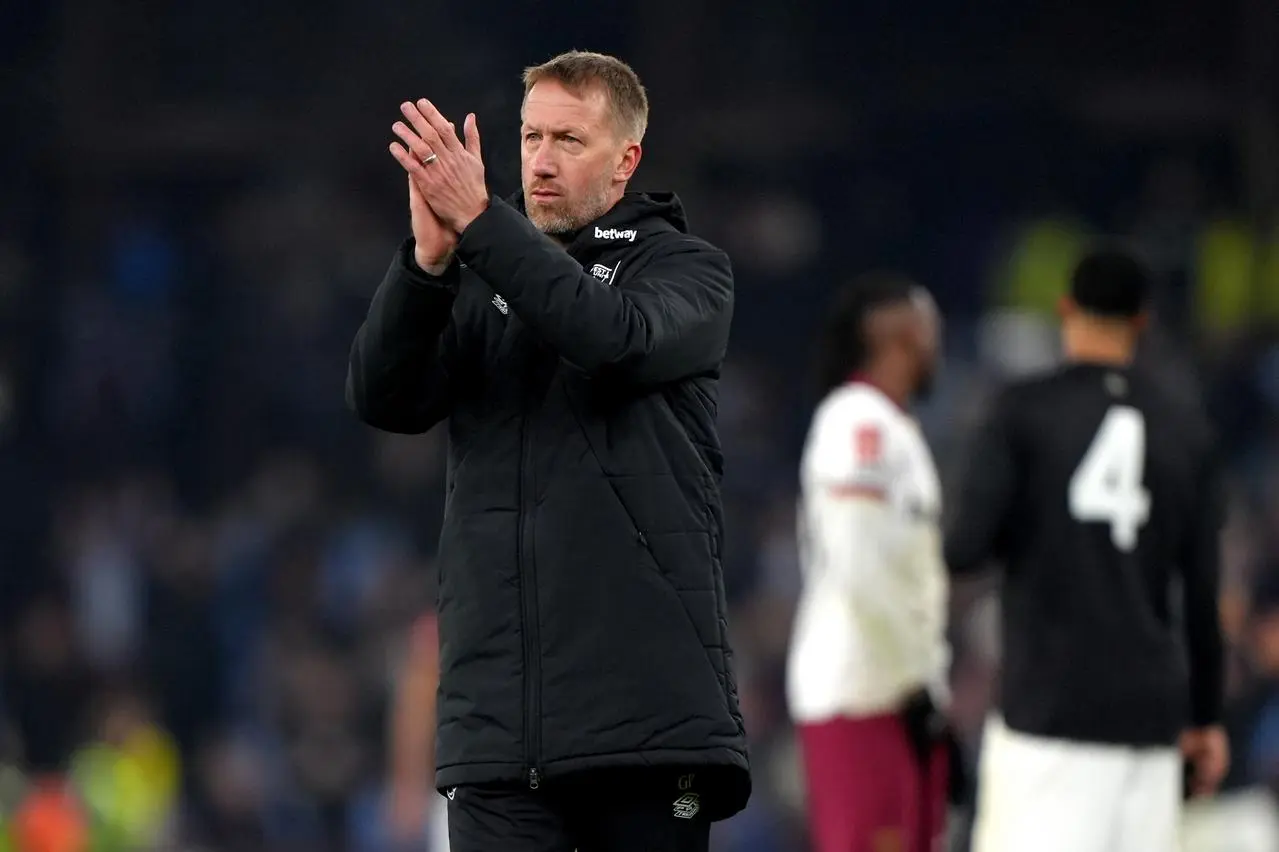 Graham Potter claps the West Ham fans