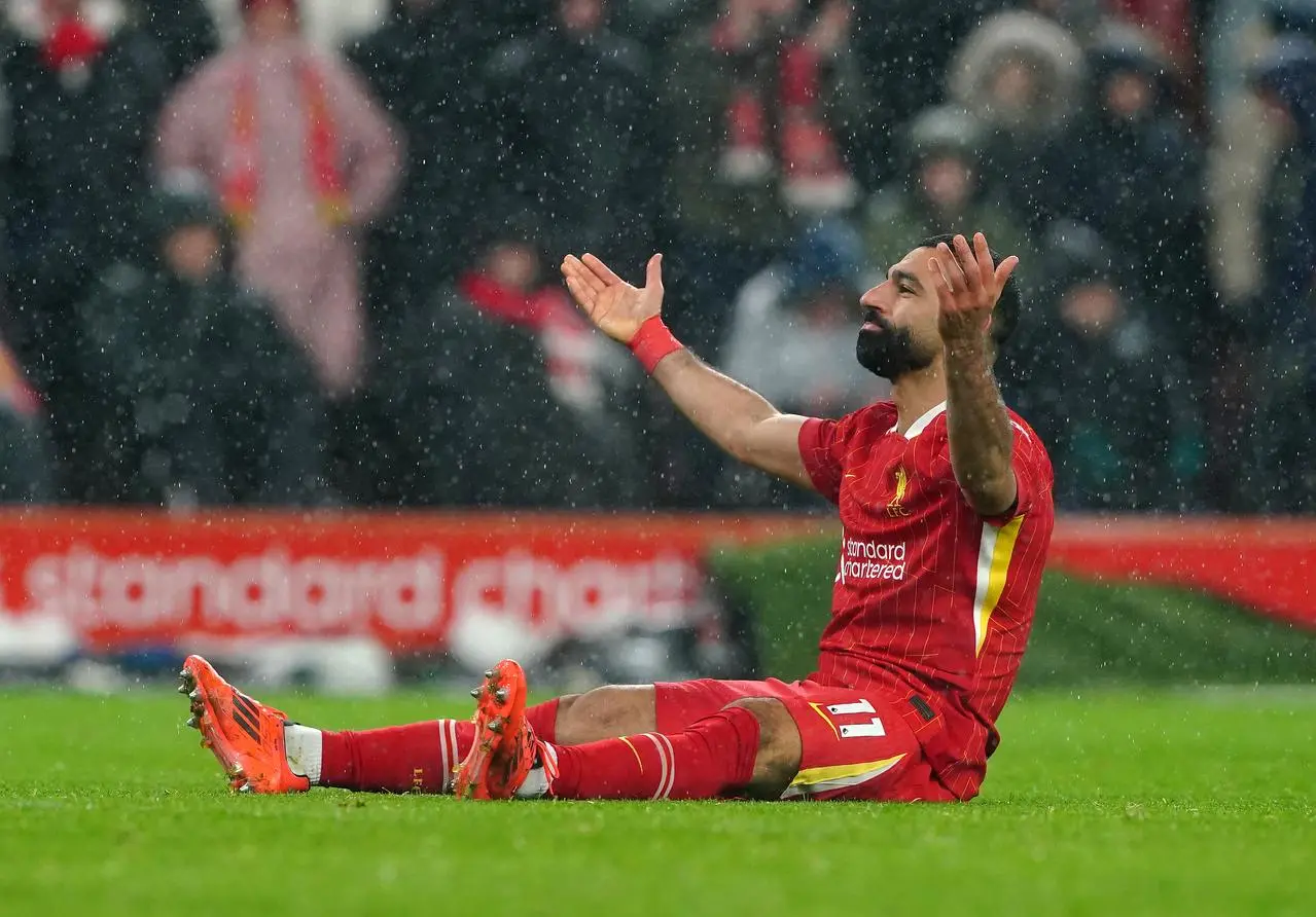 Mohamed Salah celebrates scoring Liverpool’s second goal from a penalty