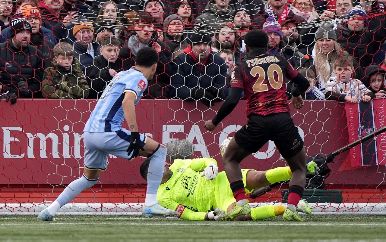 Tamworth's Nathan Tshikuna scores an own goal