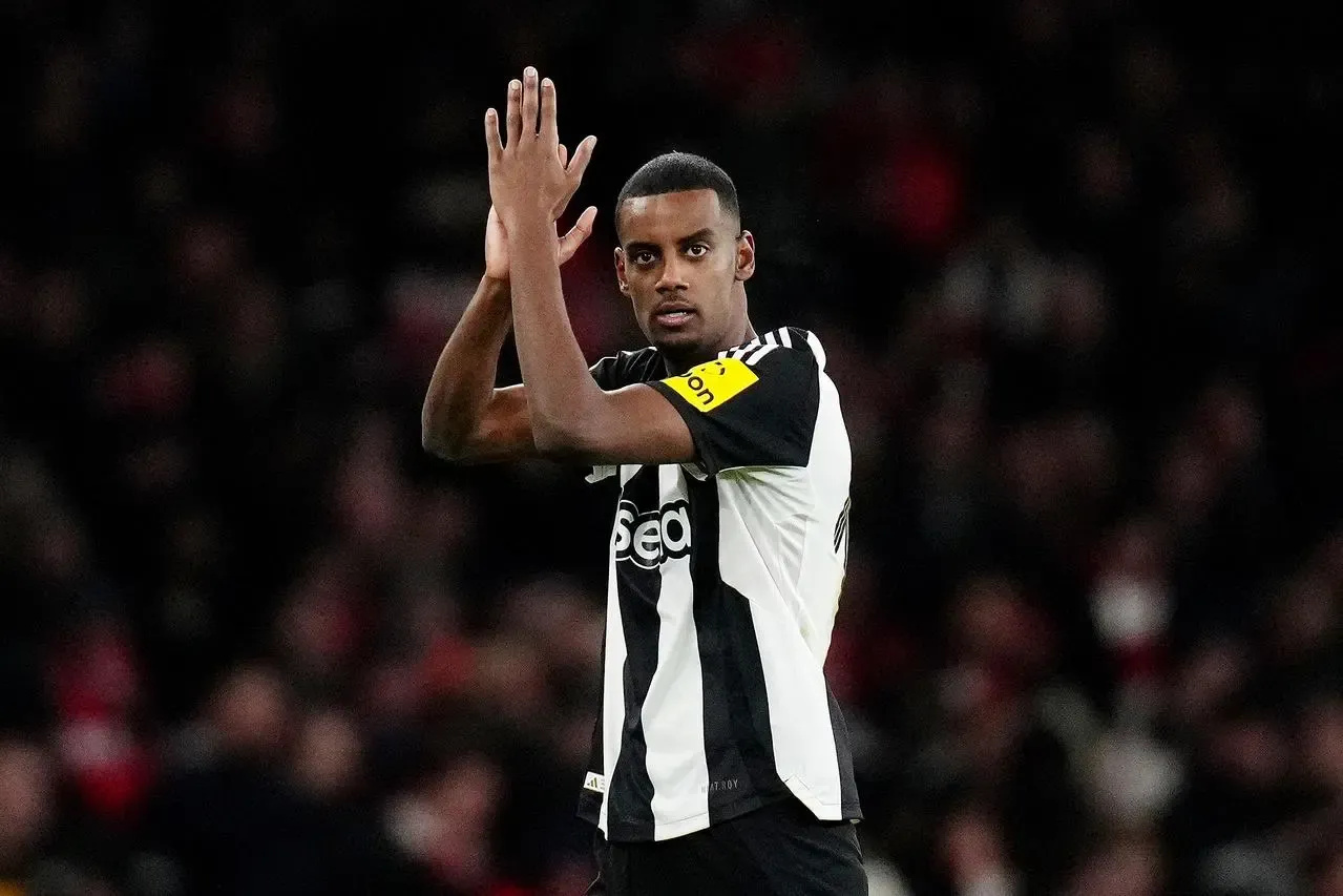 Alexander Isak claps the Newcastle fans