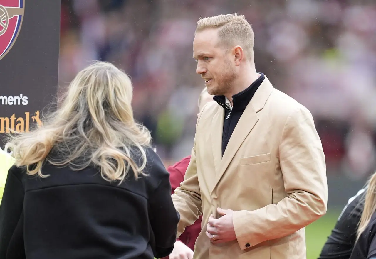 Arsenal manager Jonas Eidevall, right, with Chelsea manager Emma Hayes, left, ahead of last season's Continental Cup final