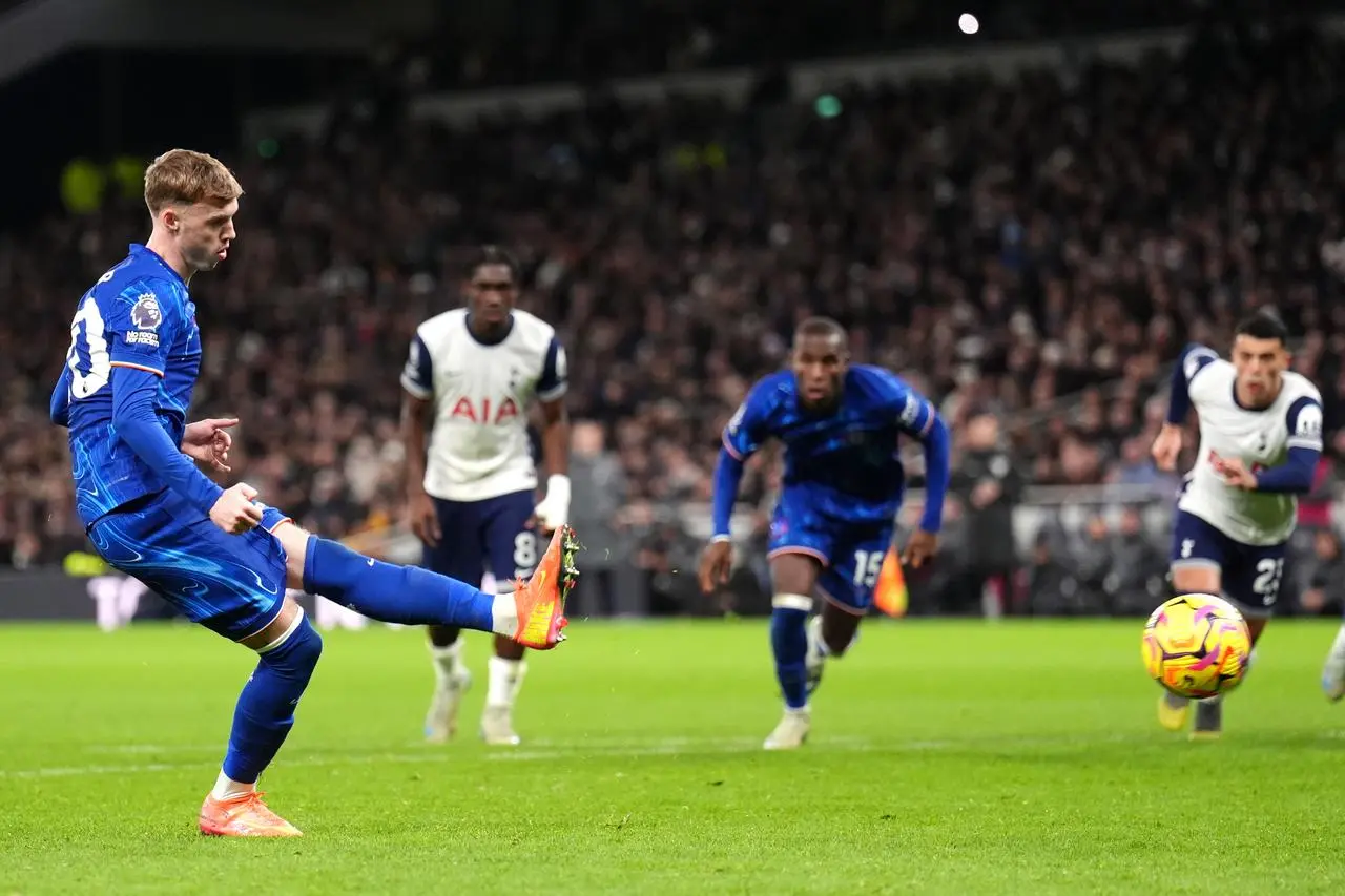 Chelsea’s Cole Palmer scores a penalty against Tottenham