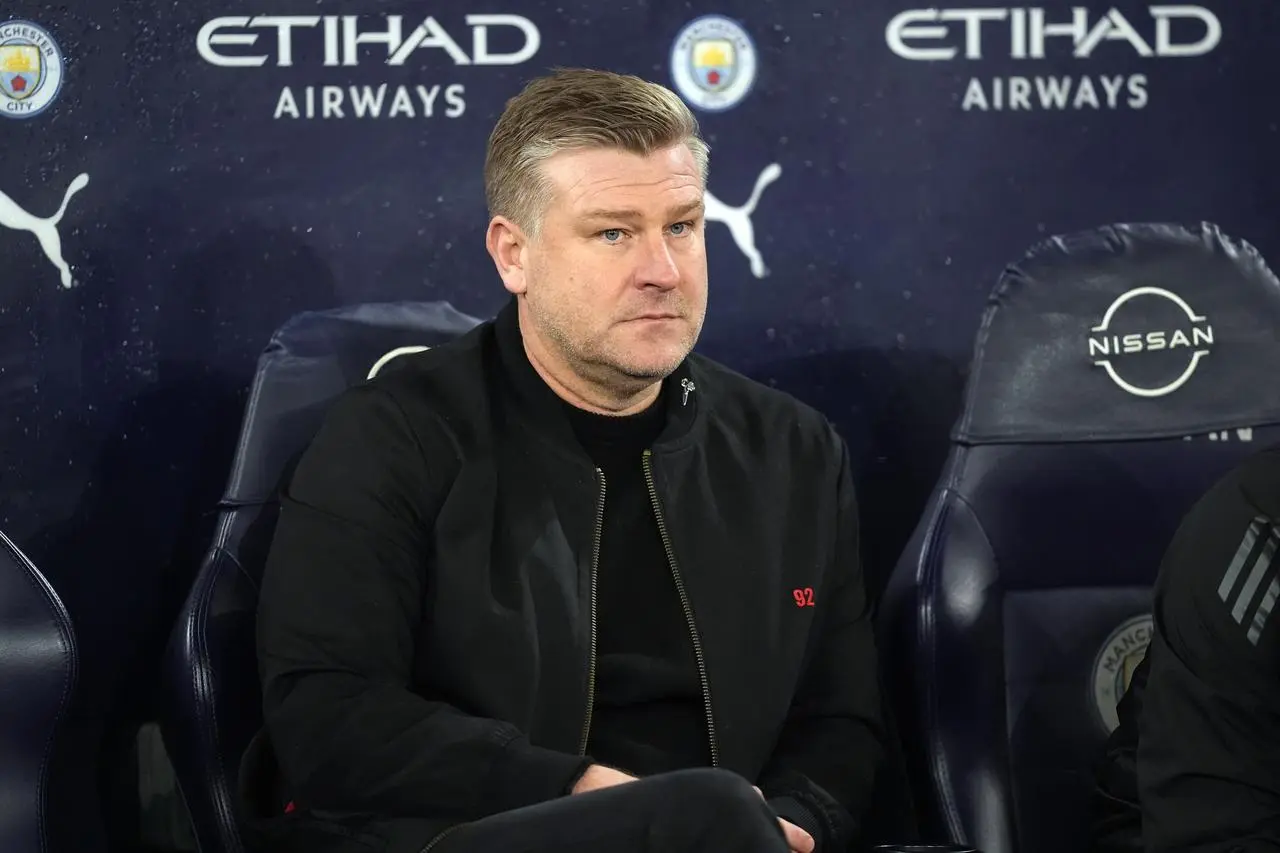 Salford City manager Karl Robinson looks on from the touchline