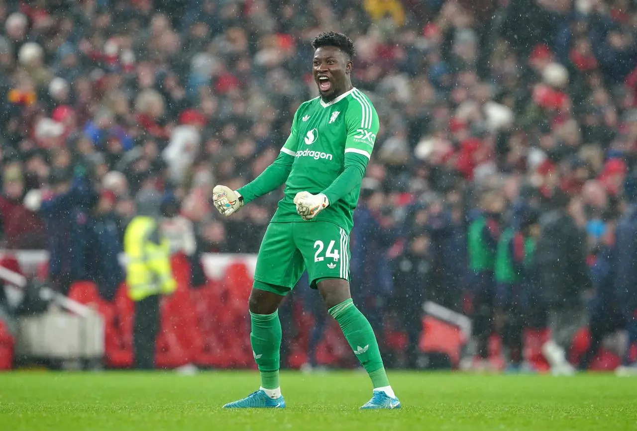 Andre Onana celebrates Manchester United's equaliser at Liverpool