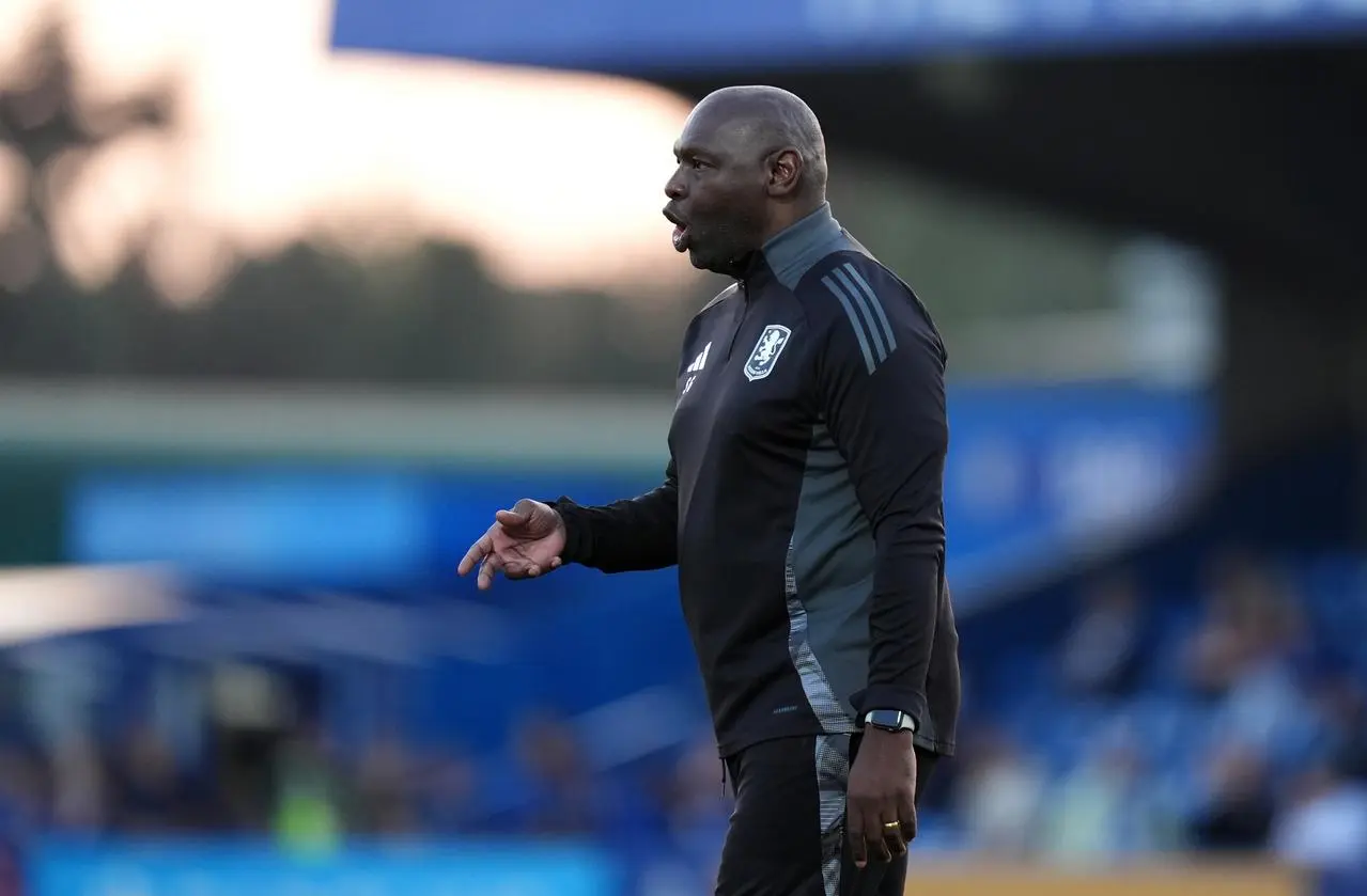 Shaun Goater on the touchline