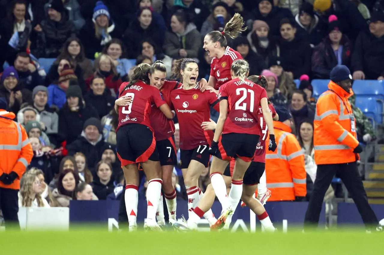 Manchester United players celebrating