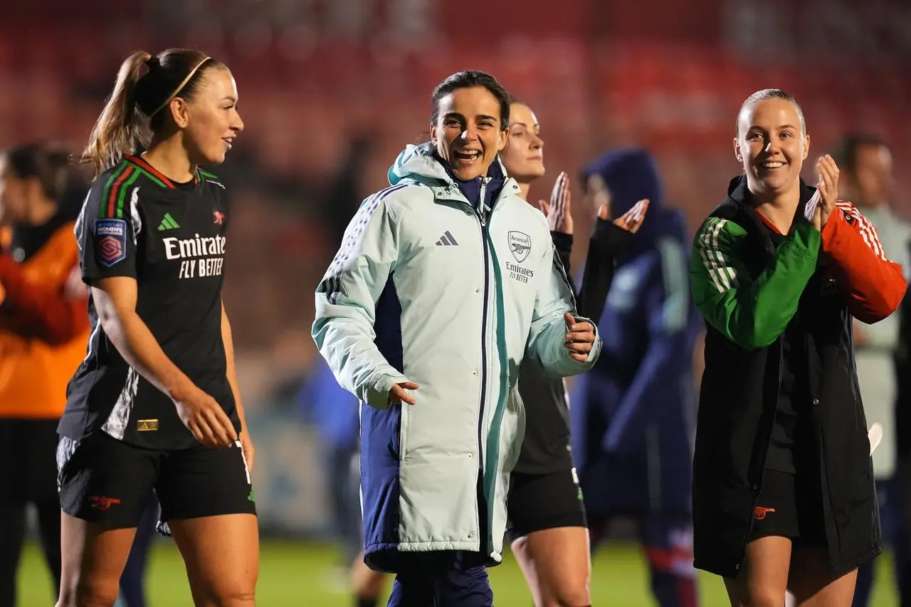 Renee Slegers walking with players