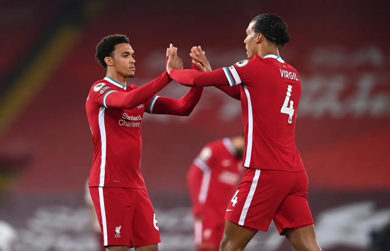 Liverpool’s Trent Alexander-Arnold, left, and Virgil van Dijk