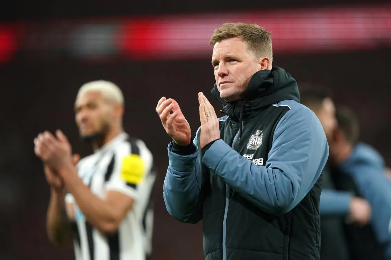 Newcastle manager Eddie Howe applauds fans after his side's Carabao Cup final defeat to Manchester United in 2023