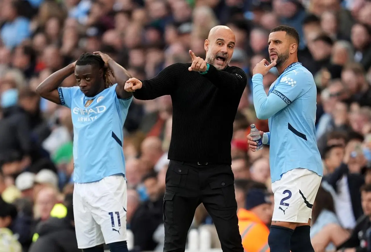 Pep Guardiola issues instructions to Kyle Walker on the touchline