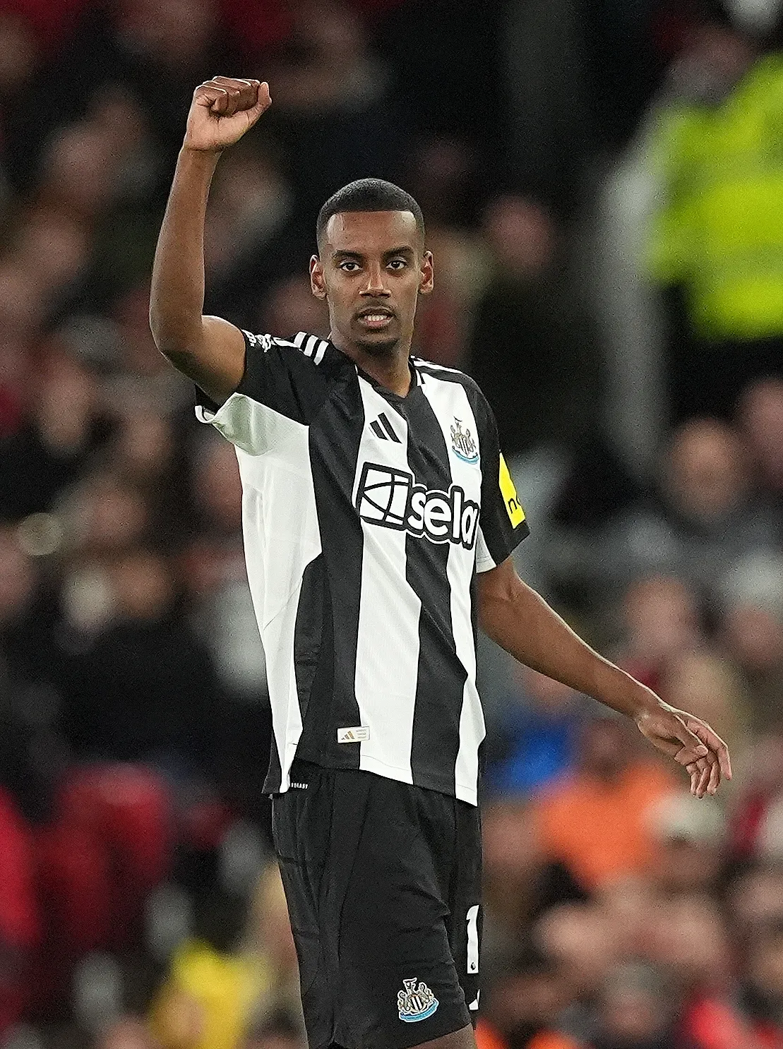 Newcastle United’s Alexander Isak raises his fist to celebrate scoring during his side's Premier League win against Manchester United at Old Trafford