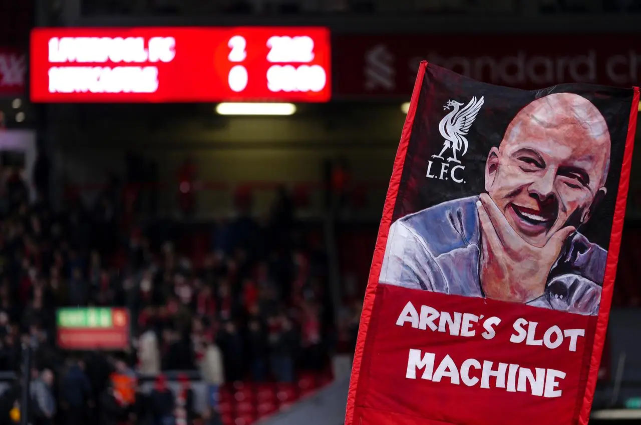 A view of a banner of Liverpool manager Arne Slot 