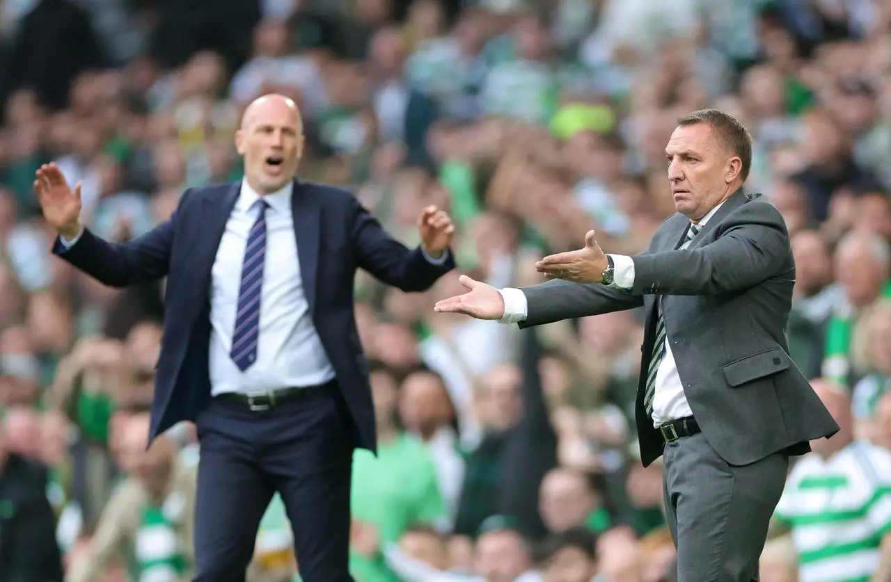 Brendan Rodgers, right, and Philippe Clement on the touchline