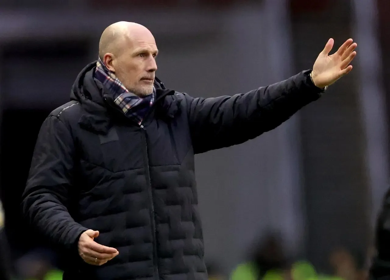 Rangers manager Philippe Clement gestures with his left arm outstretched during the defeat to Queen's Park