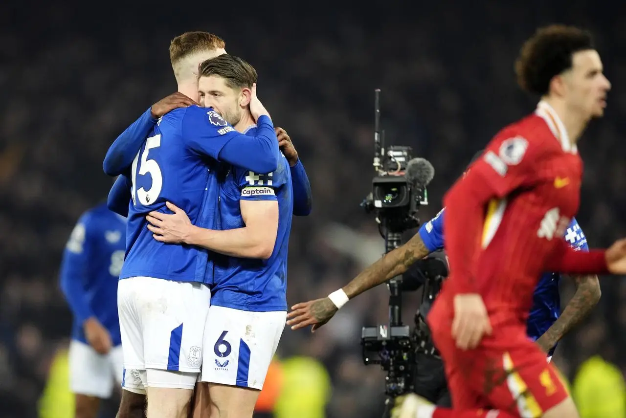 Everton’s Jake O’Brien (left) and James Tarkowski celebrate against Liverpoo