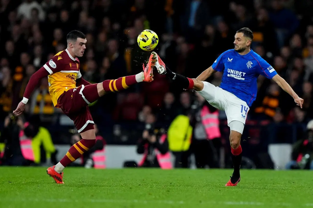 Lennon Miller, left, controls a high ball against Rangers