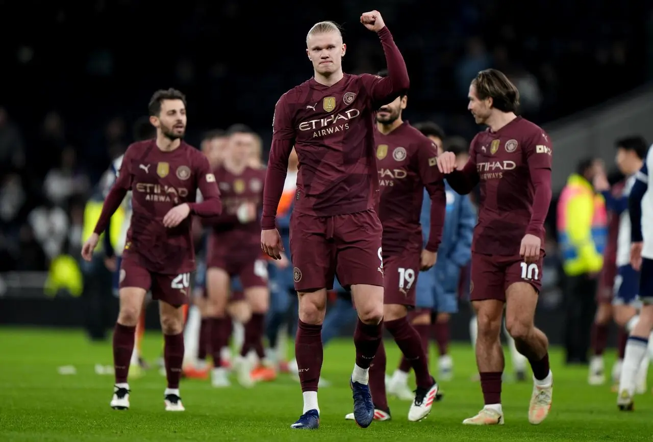 Manchester City’s Erling Haaland (centre) celebrates after the Premier League match at Tottenham