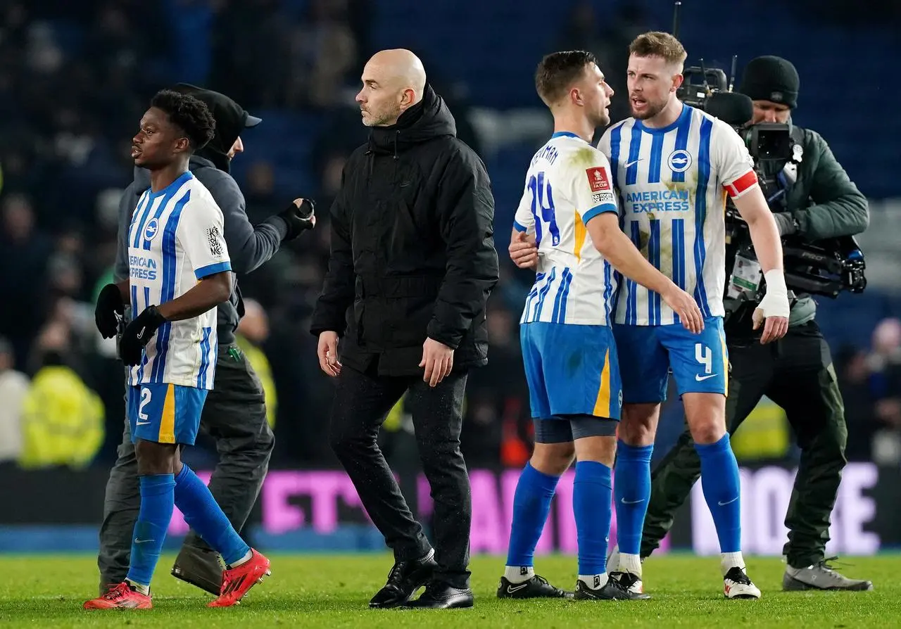 Chelsea manager Enzo Maresca (centre left) after the FA Cup fourth round match at the Amex Stadium