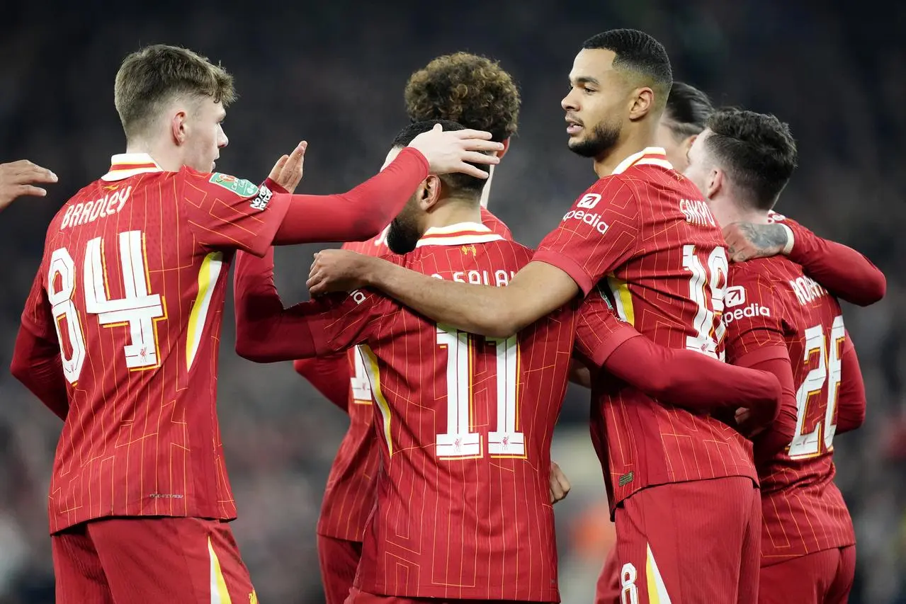 Liverpool’s Cody Gakpo (centre right) celebrates scoring in the Carabao Cup semi-final second leg against Tottenham at Anfield