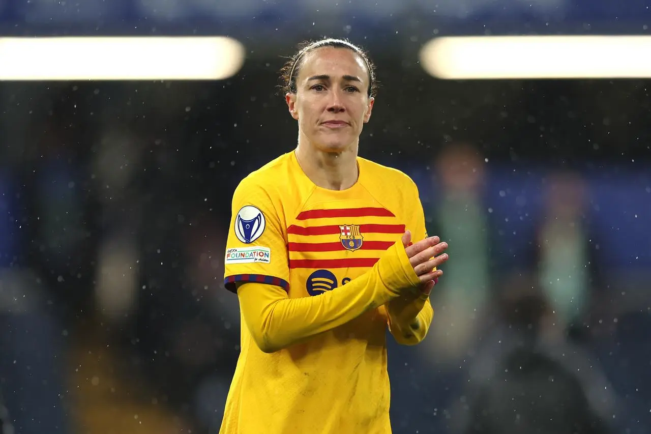 Barcelona’s Lucy Bronze applauds the fans