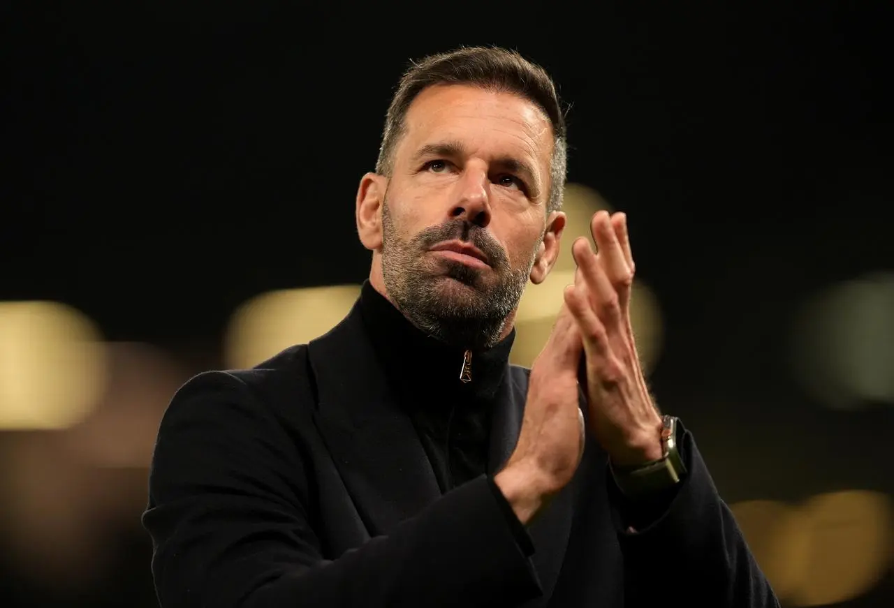 Leicester manager Ruud van Nistelrooy applauds the fans