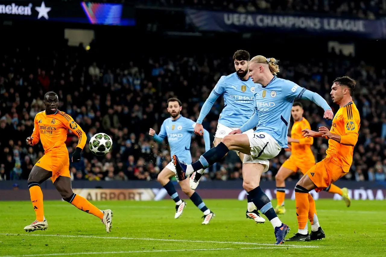 Manchester City’s Erling Haaland scores the first goal of the game