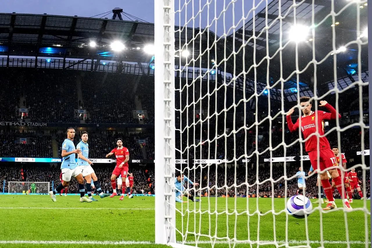 Dominik Szoboszlai scores Liverpool's second goal against Manchester City