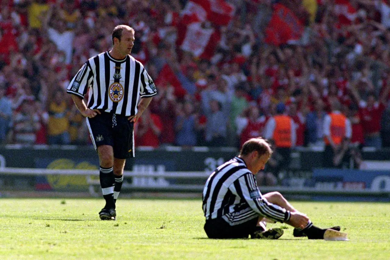 Dejection for Newcastle’s Alan Shearer (standing) and David Batty after a 2-0 FA Cup final defeat by Arsenal 