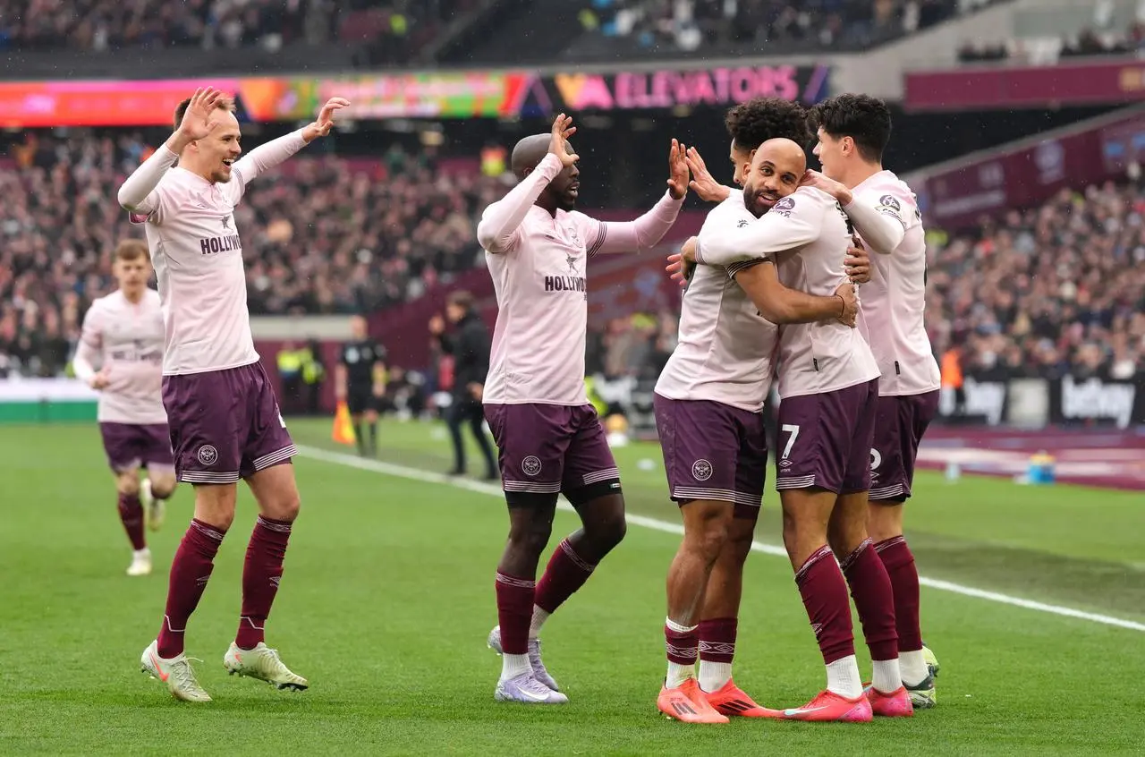 Brentford’s Kevin Schade (second right) celebrates with team-mates