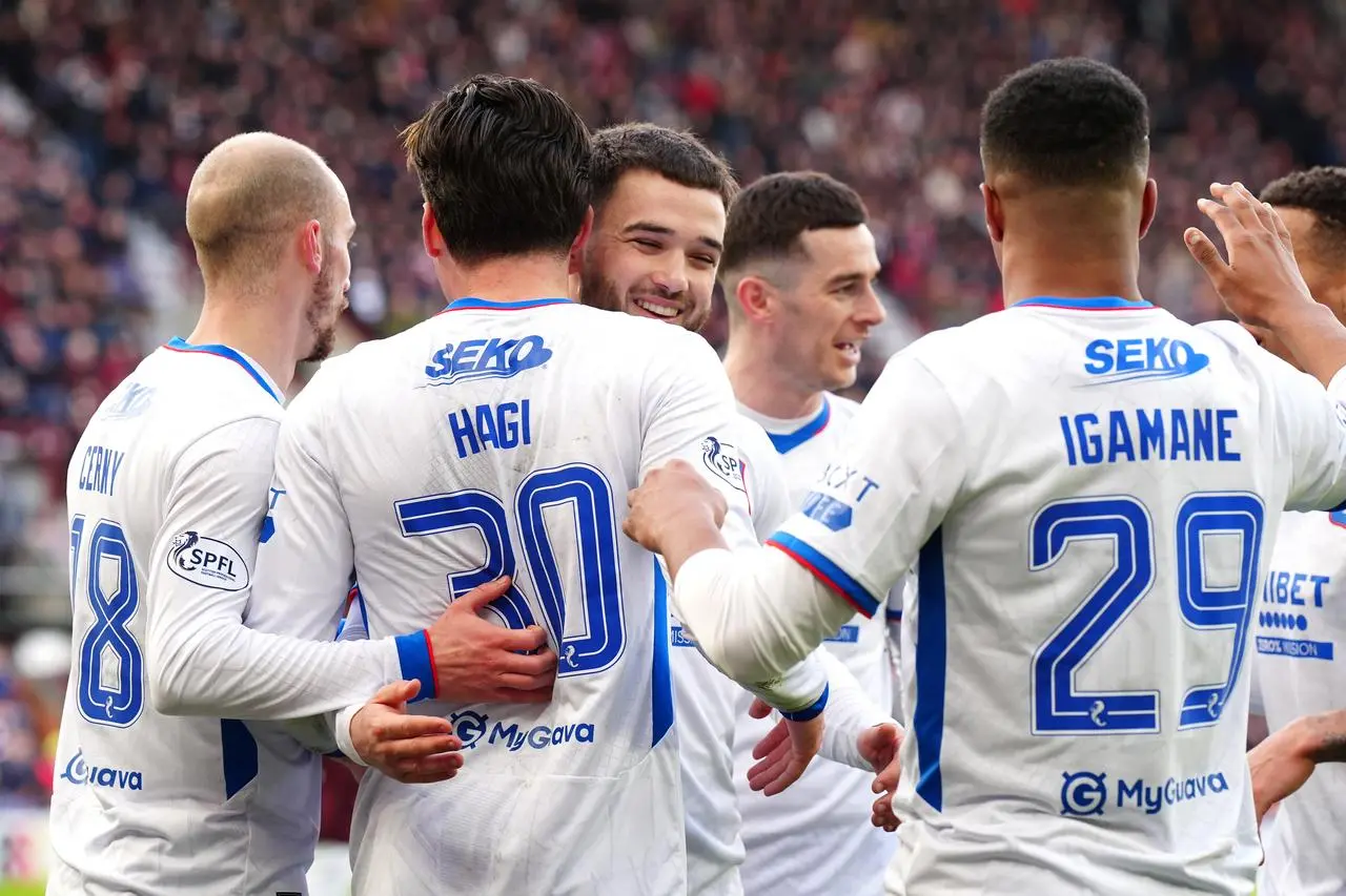 Rangers celebrate their first goal against Hearts