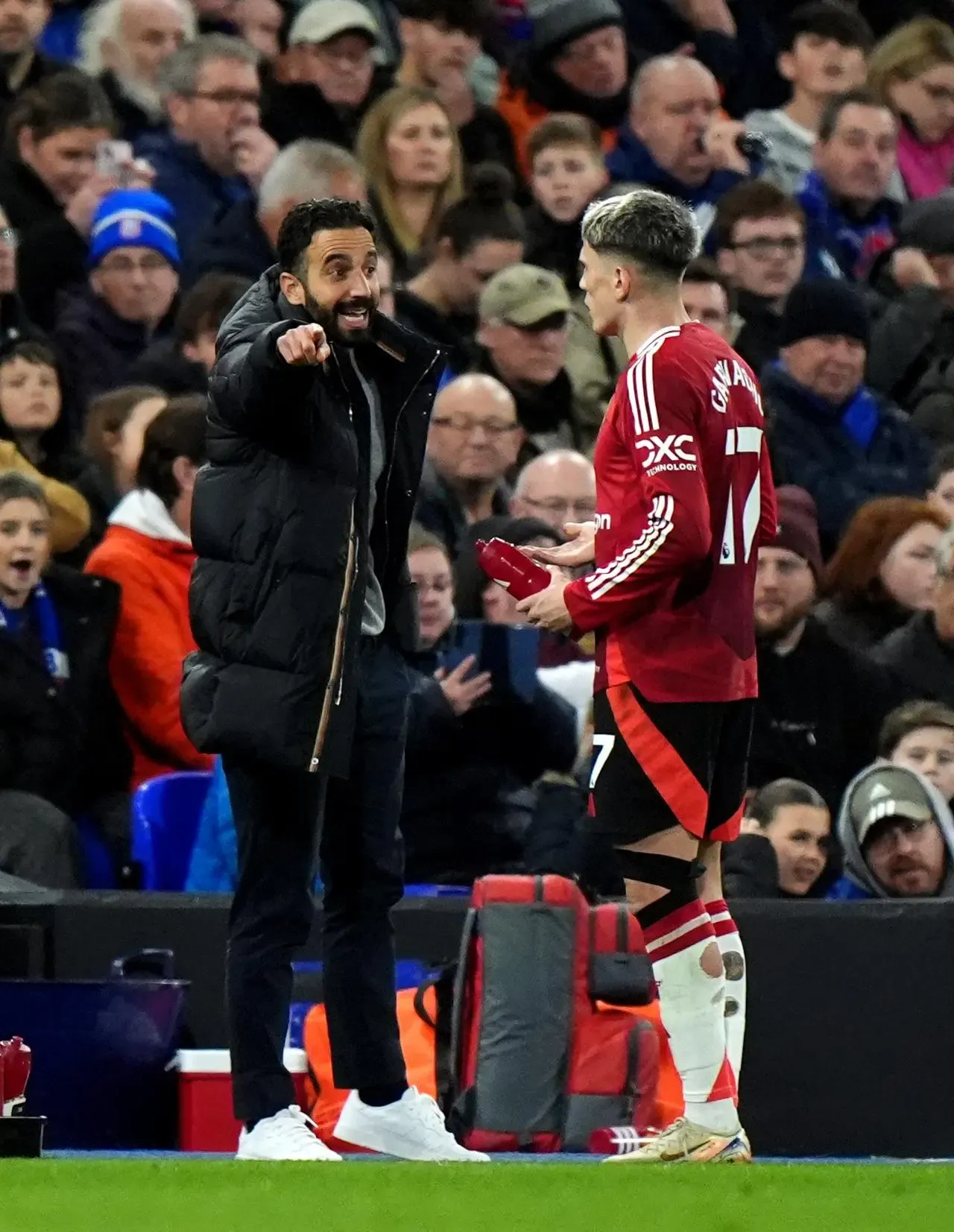 Manchester United head coach Ruben Amorim issues instructions to Alejandro Garnacho at Ipswich