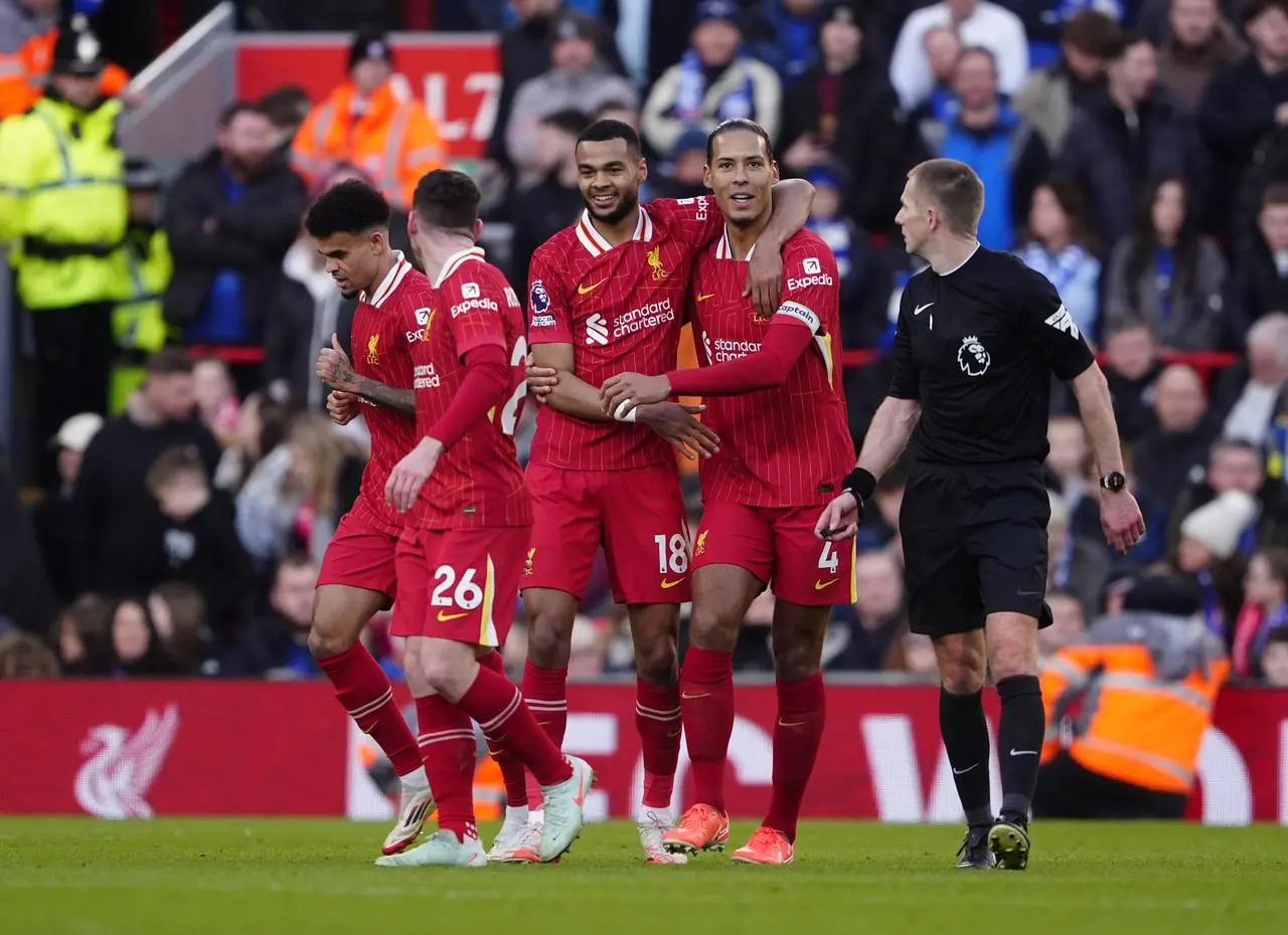 Liverpool’s Cody Gakpo (left) celebrates scoring his side’s third goal against Ipswich