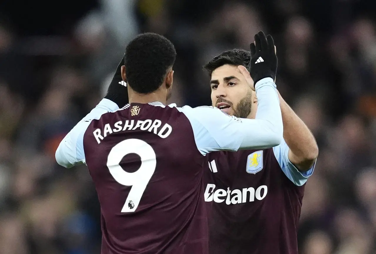 Aston Villa’s Marcus Rashford and Marco Asensio celebrate following the 2-1 Premier League victory over Chelsea