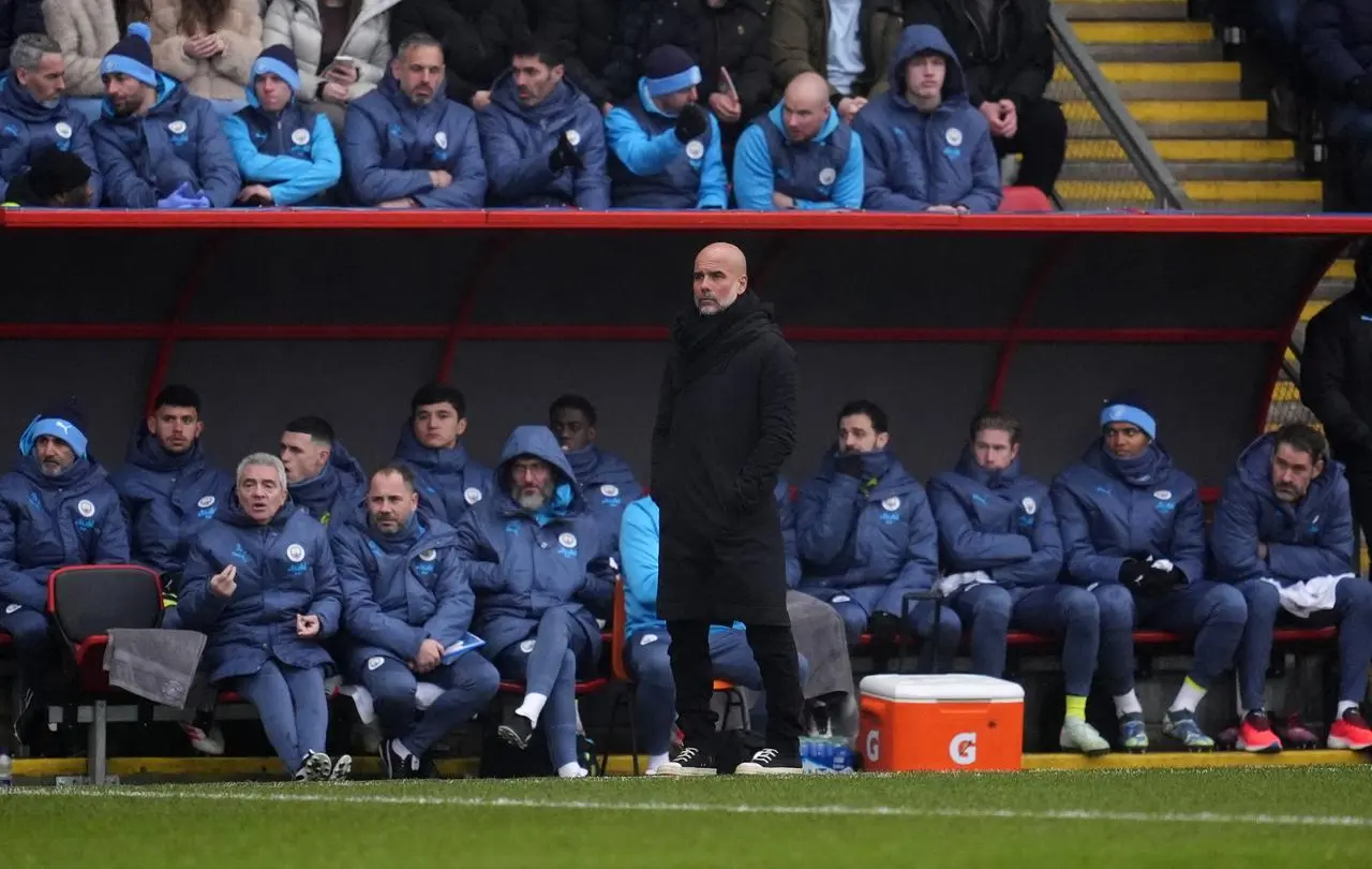 Pep Guardiola in the dugout