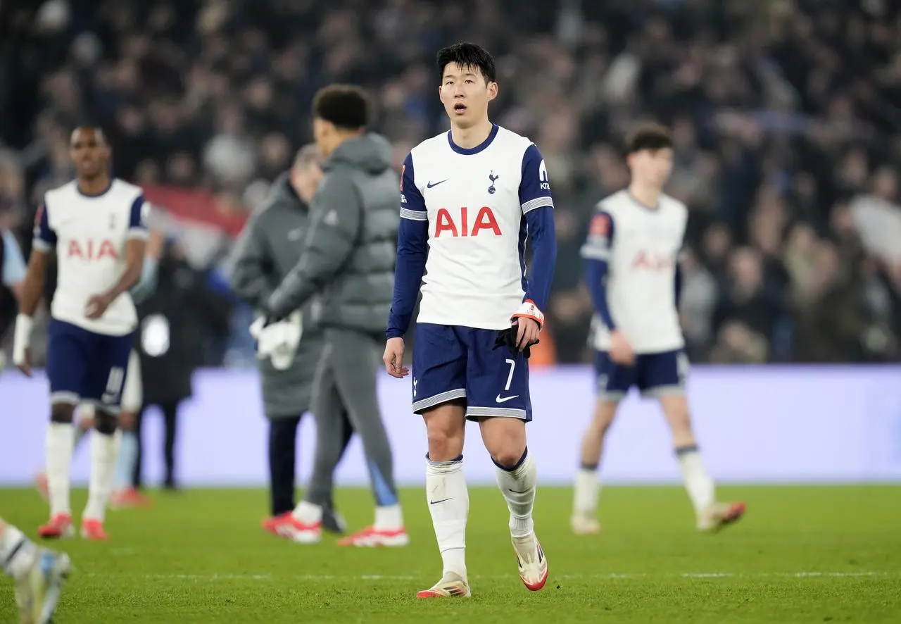 Tottenham captain Son Heung-min walks on the pitch after the final time whistle