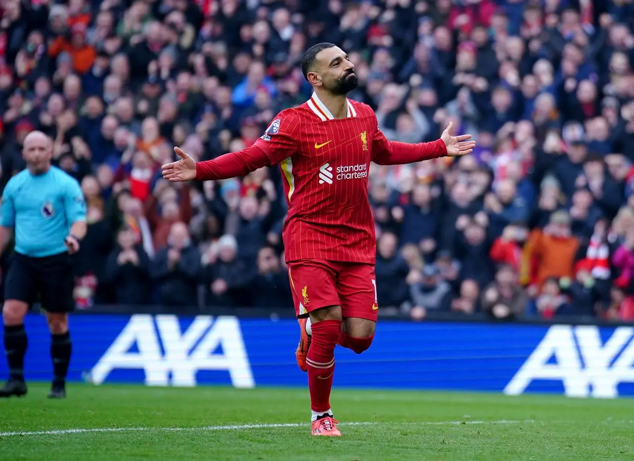 Liverpool’s Mohamed Salah celebrates scoring t