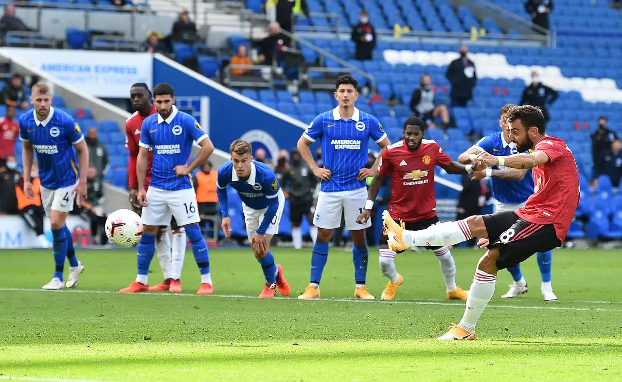 Bruno Fernandes scores Manchester United’s late winner from the penalty spot against Brighton in September 2020