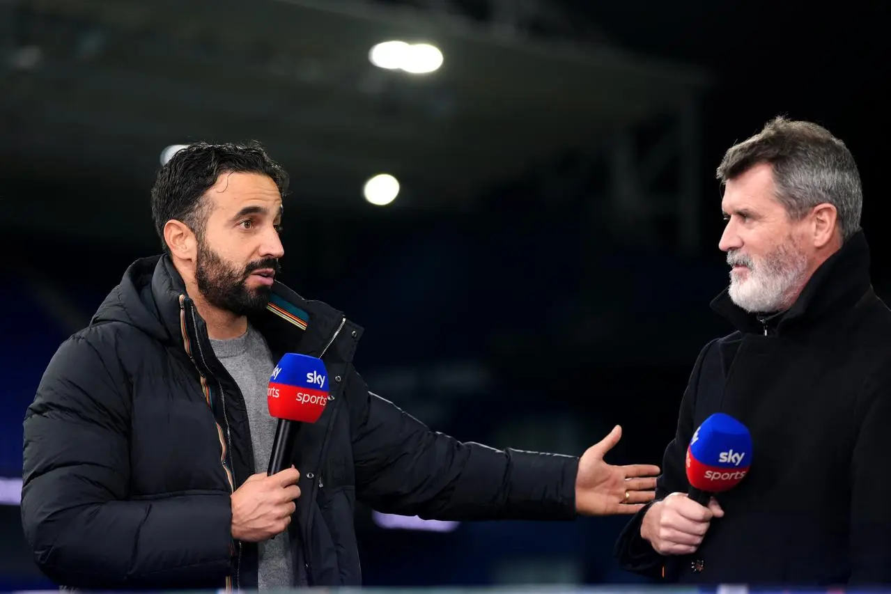 Manchester United manager Ruben Amorim, left, is interviewed by Sky Sports pundit Roy Keane