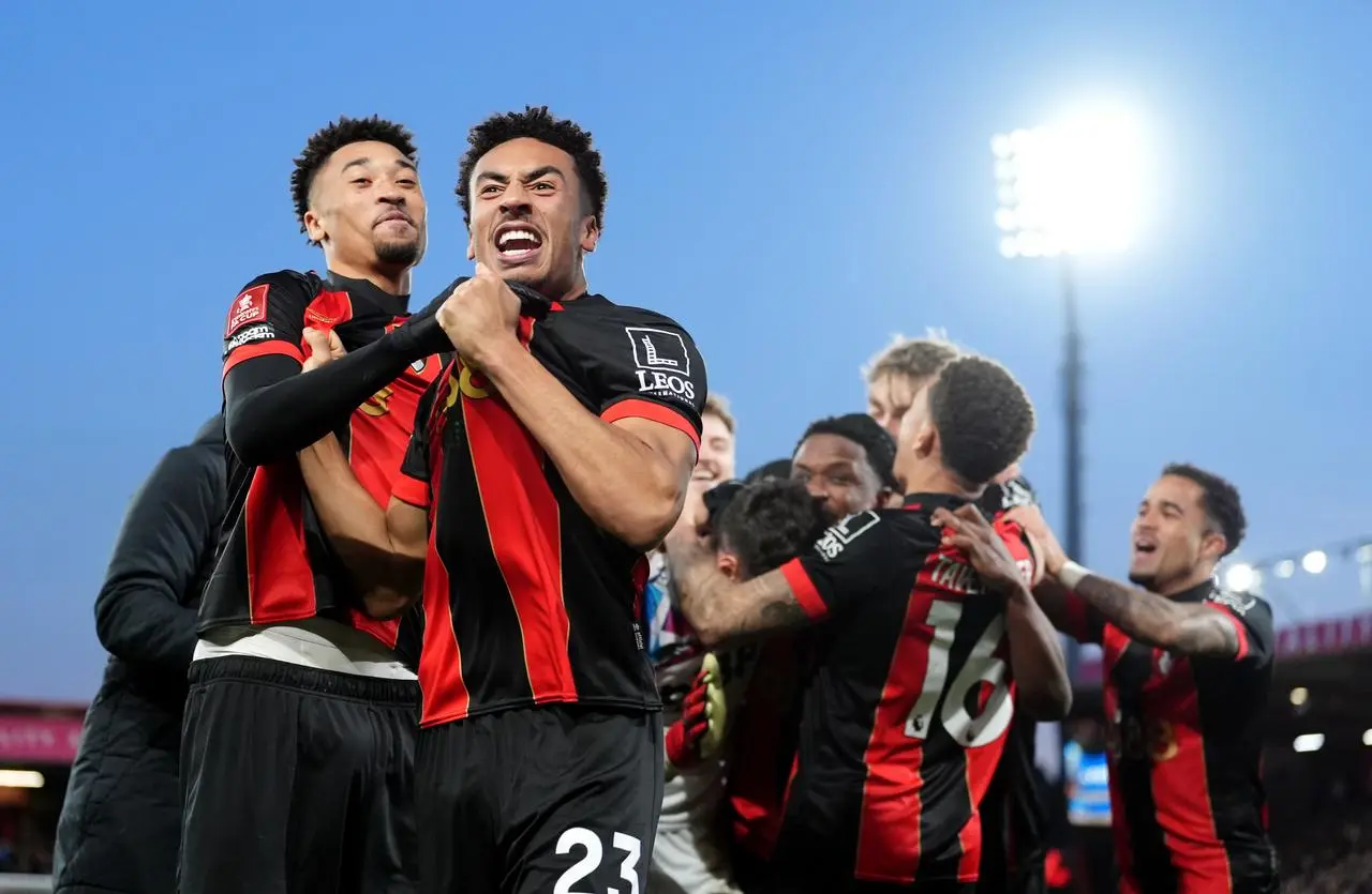 Bournemouth players celebrate their FA Cup fifth-round win over Wolves.