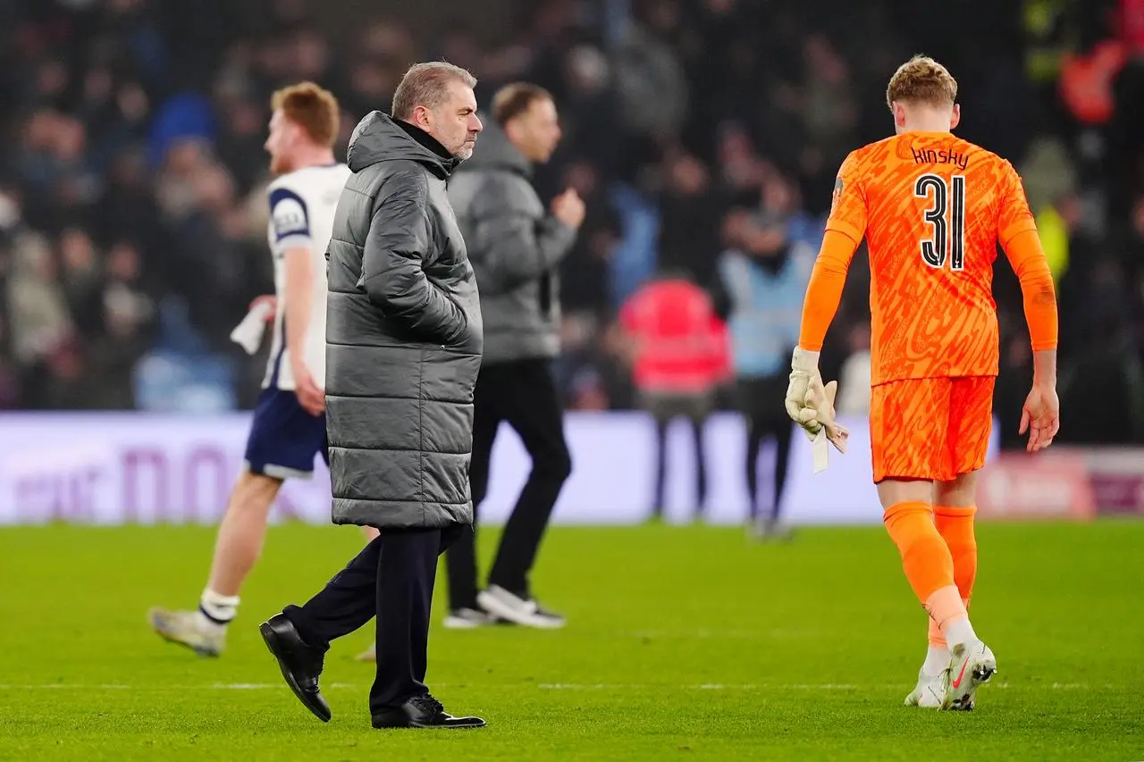 Tottenham manager Ange Postecoglou, left, and goalkeeper Antonin Kinsky react after this season's FA Cup exit to Aston Villa