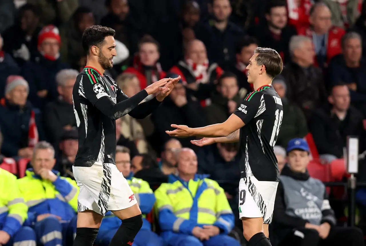 Mikel Merino, left, celebrates his goal with Leandro Trossard