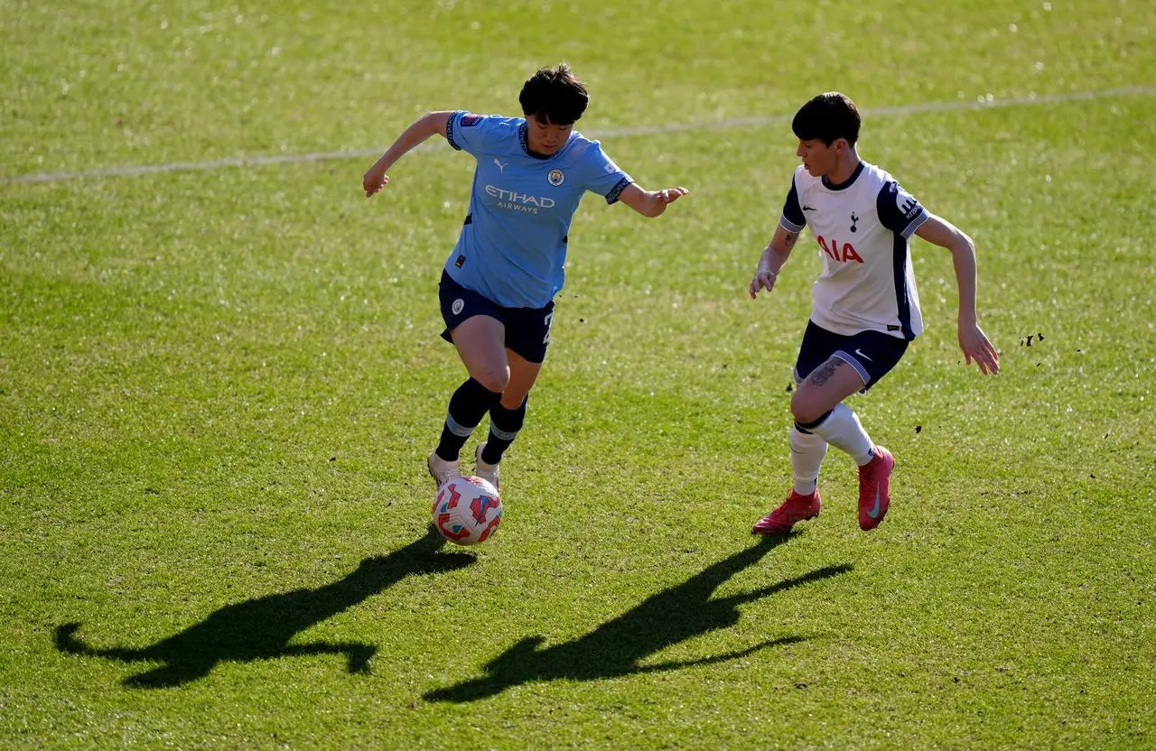 Manchester City’s Aoba Fujino (left) and Tottenham Hotspur’s Ashleigh Neville in action