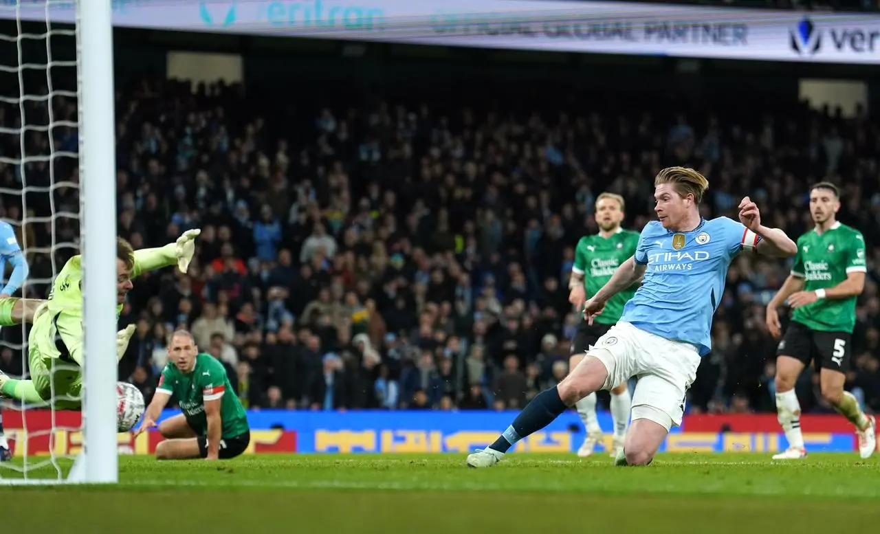 Manchester City’s Kevin De Bruyne scores their side’s third goal against Plymouth