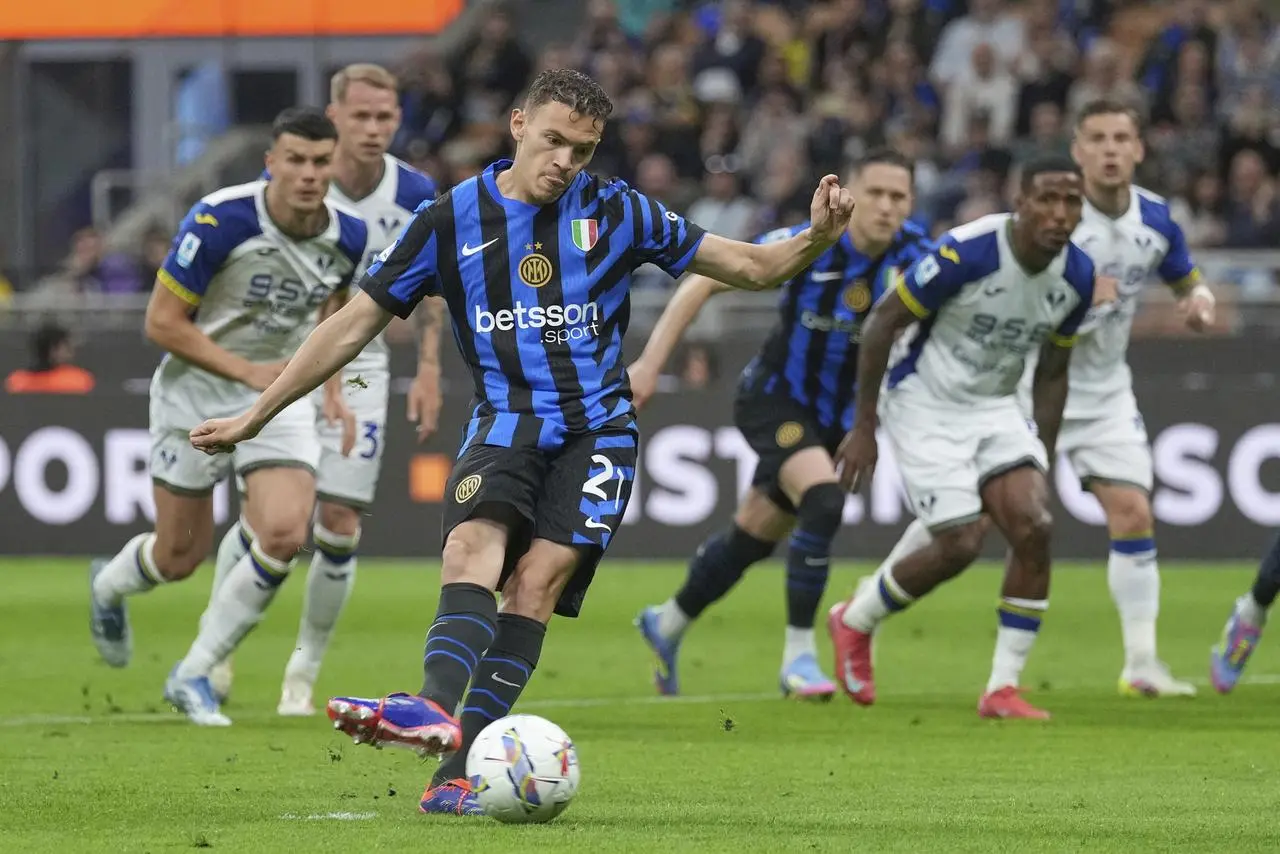 Kristjan Asllani scores the winning penalty for Inter Milan