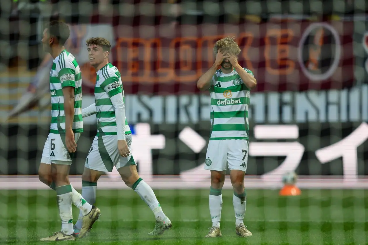 Jota has his head in hands in tears after scoring at Fir Park